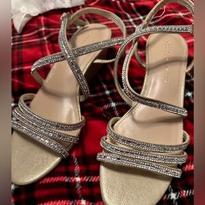 New on the box. Never worn. Bought for wedding, decided on another shoe.